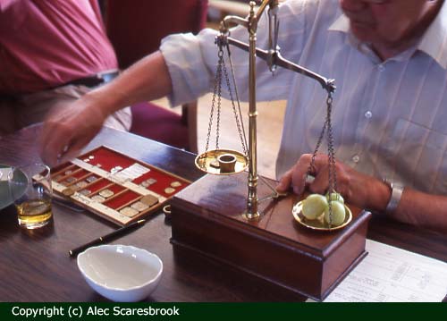 Weighing the berries.